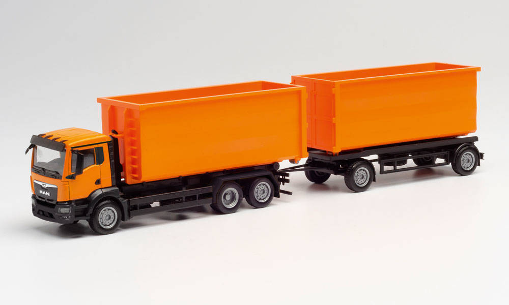 1/87 MAN TGX NN Abrollmulden-Hingerzug kommunalorange